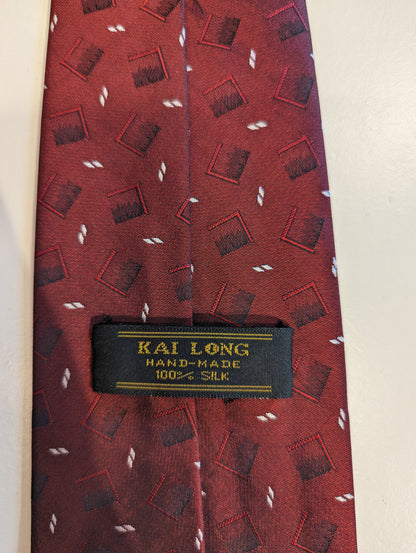 Vintage Kai Long Hand Made Silk Tie. Motivo rojo en blanco y negro.