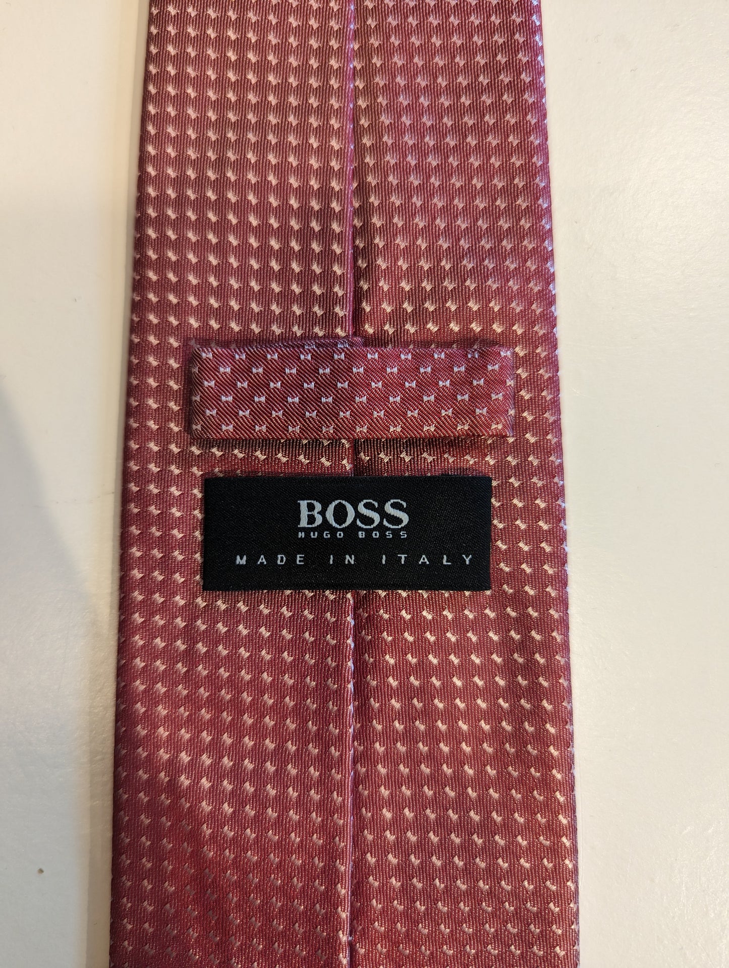 Hugo Boss silk tie. Pink white motif.