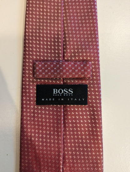 Cravatta di seta Boss Hugo. Motivo bianco rosa.