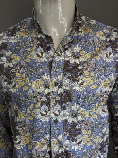 Esiste una camicia. Fiori gialli marroni blu stampa. Taglia L.