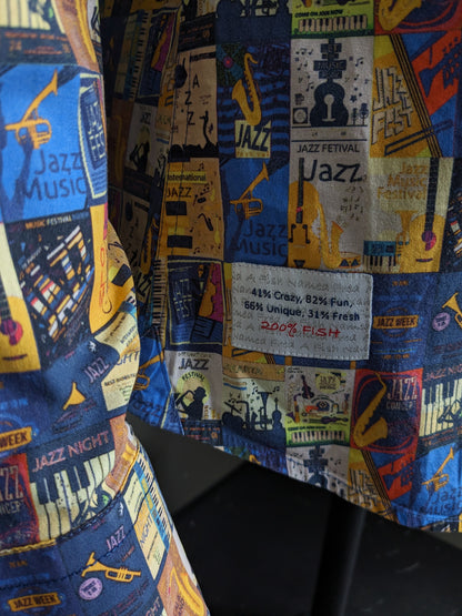 A Fish Named Fred shirt. Yellow blue red colored jazz print. Size M.