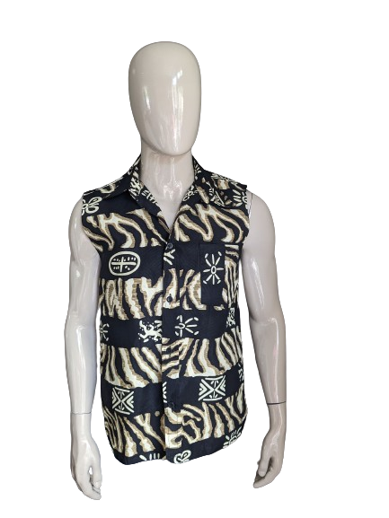 T-shirt sans manches. Impression africaine beige jaune noir.  Taille M / L.