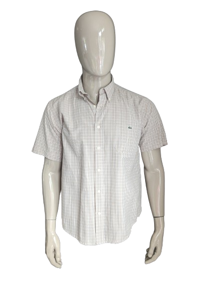 Camicia lacosta vintage manica corta. Blu marrone controllato. Dimensione 42 / L.