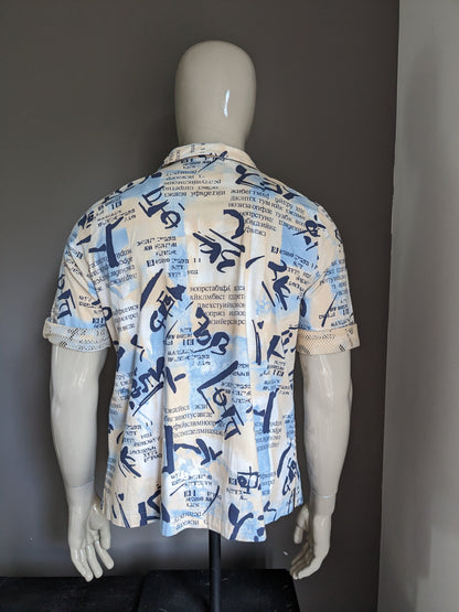 Vintage -Shirt Kurzarm und Reißverschluss. Beige Blue Print mit Netzanwendungen. Größe L.