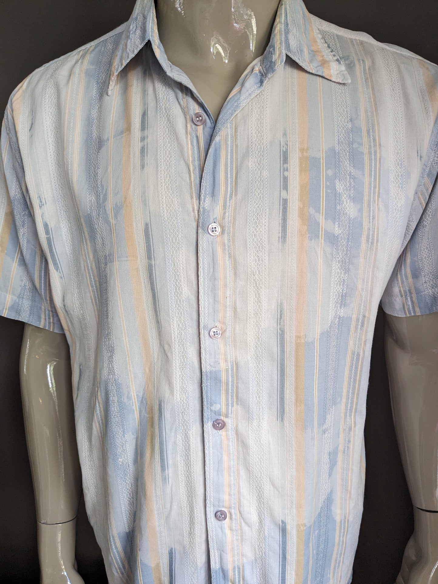 Casa Blanca shirt short sleeve. Light blue white, light orange motif. Size XL.