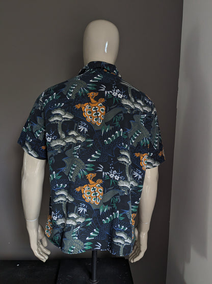 H&M Shirt short sleeve. Black green orange print. Size oversized m / l.