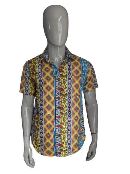 Amparo shirt short sleeve. Yellow orange blue purple print. Size M.