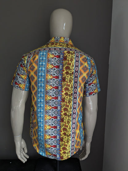 Amparo shirt short sleeve. Yellow orange blue purple print. Size M.