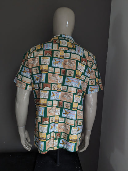 Camisa de himno manga corta. VERDE AMARILLO AZUL AZUL. Talla L.