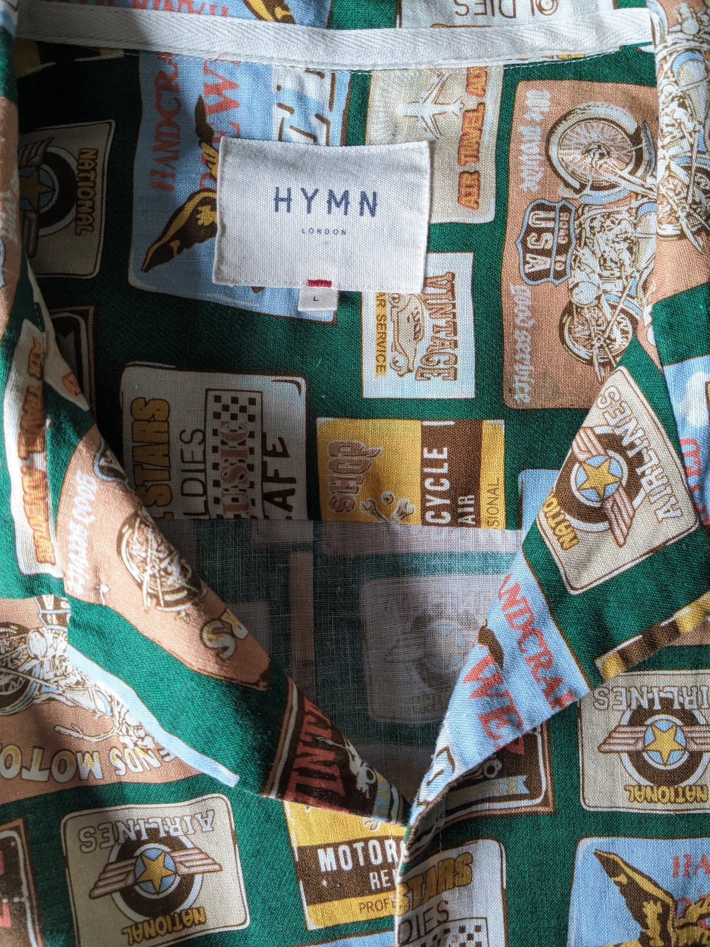 Hymn shirt short sleeve. Green yellow brown blue print. Size L.