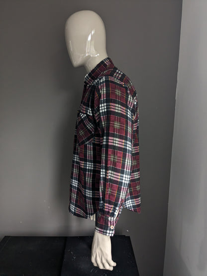 Vintage Wrangler Western flannel shirt. Red green black and white checkered. Size L.