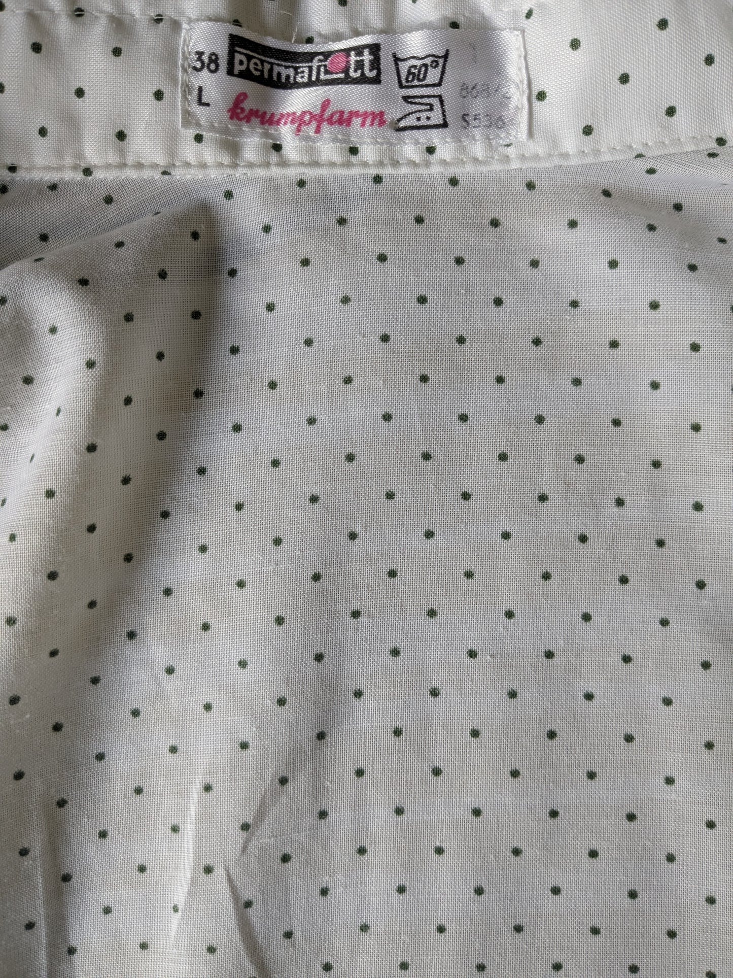 Vintage 70's shirt with point collar. White green dotted. Size L.