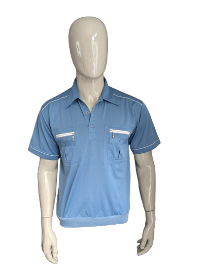 Polo humy vintage con banda elástica. Azul. Talla M.