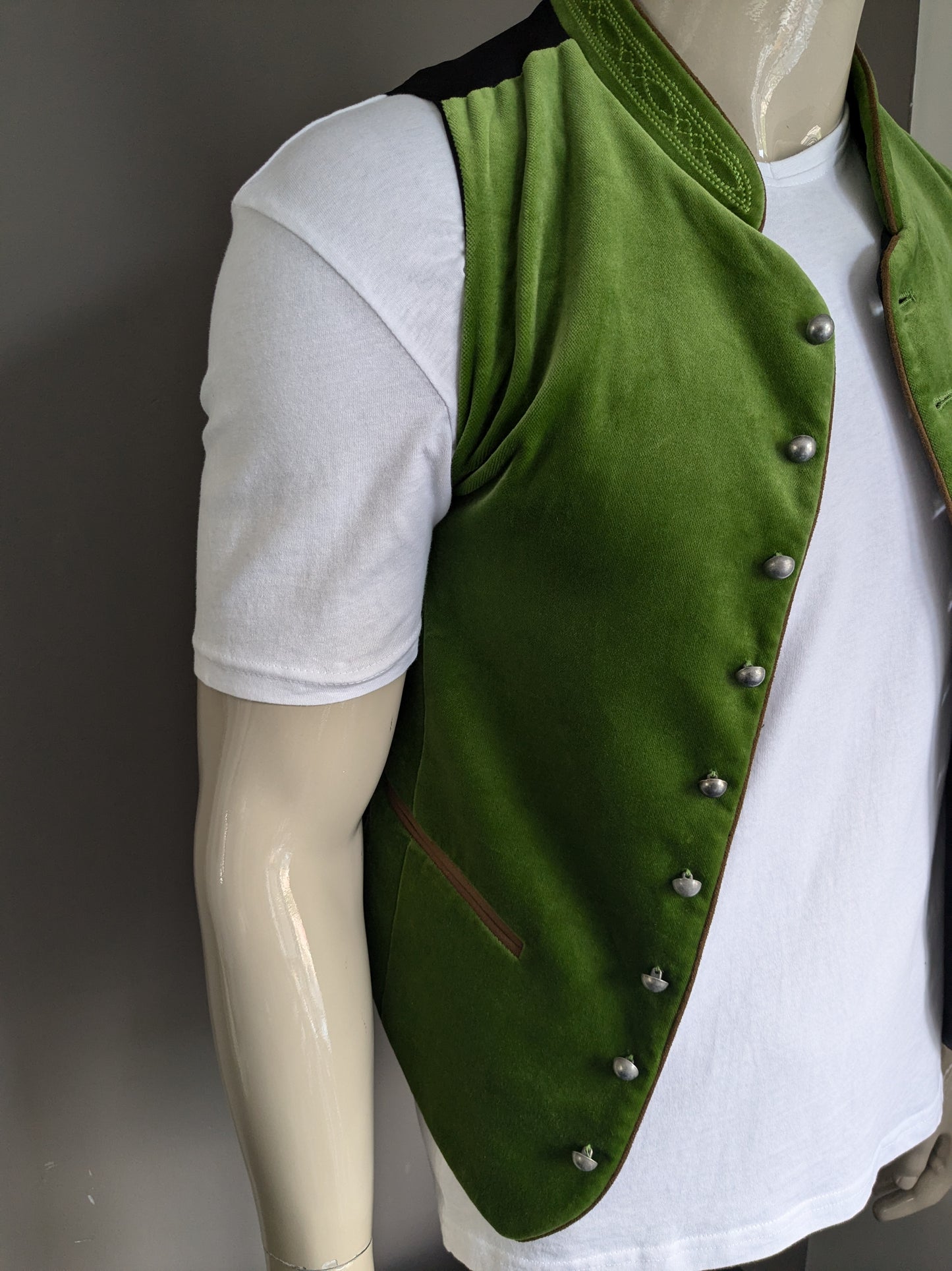 Beautiful vintage Stockerpoint waistcoat. Velvet look green with separate buttons. Size XS.