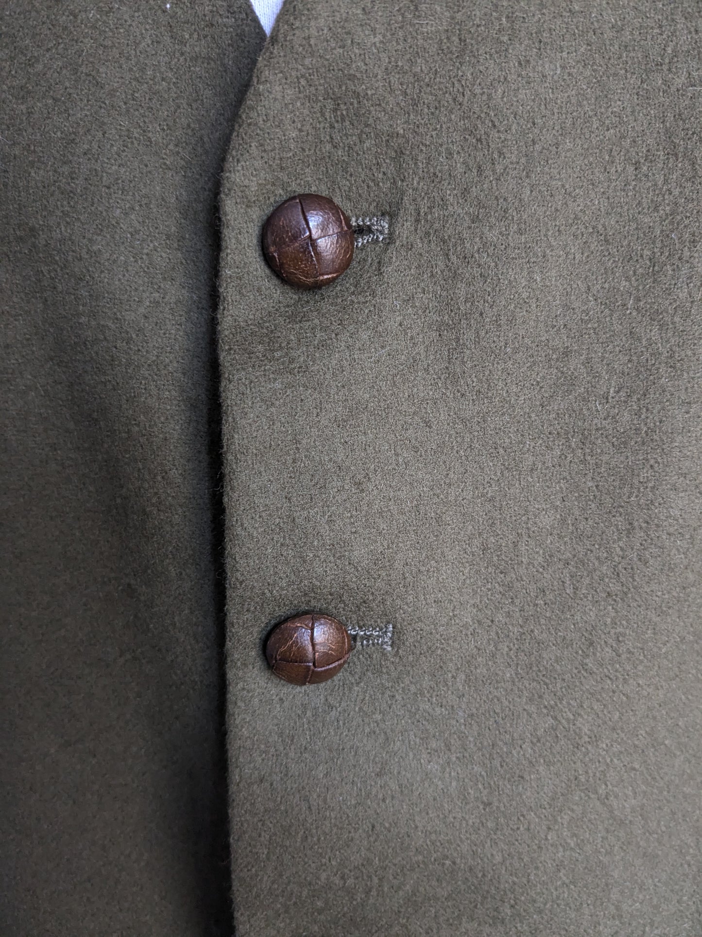 Woolen waistcoat. Dark green with beautiful buttons. Size L.