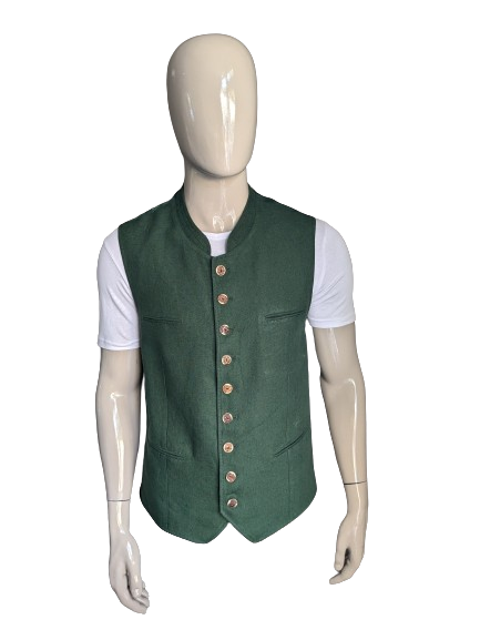 Le gilet alpin de luxe vintage avec boutons séparés. Vert. Taille 52 / L.