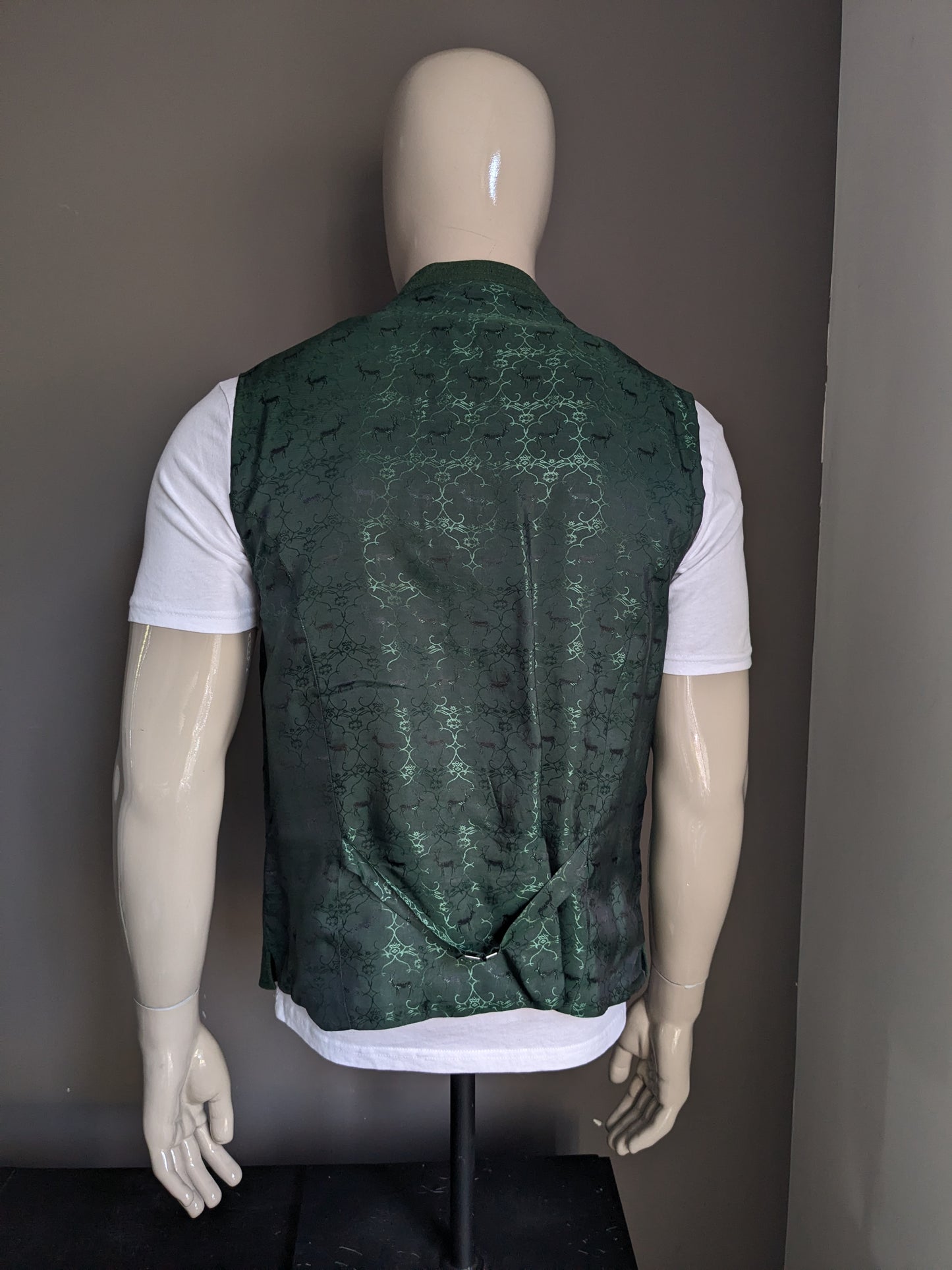 Le gilet alpin de luxe vintage avec boutons séparés. Vert. Taille 52 / L.