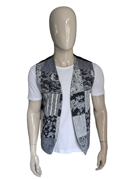 Vintage tweezijdig gilet zonder sluiting. Grijs zwarte print. Maat L.