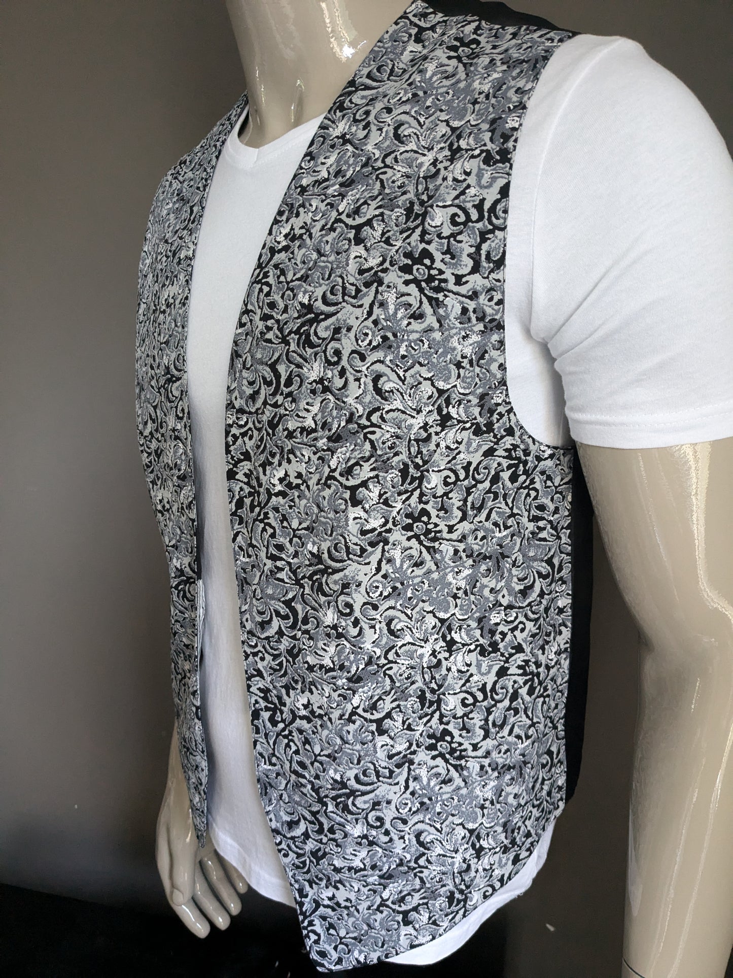 Vintage two -sided waistcoat without closure. Gray black print. Size L.