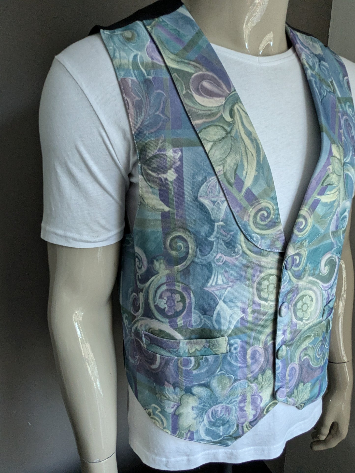 Vintage gilet met revers. Groen blauw paarse print. Maat L.