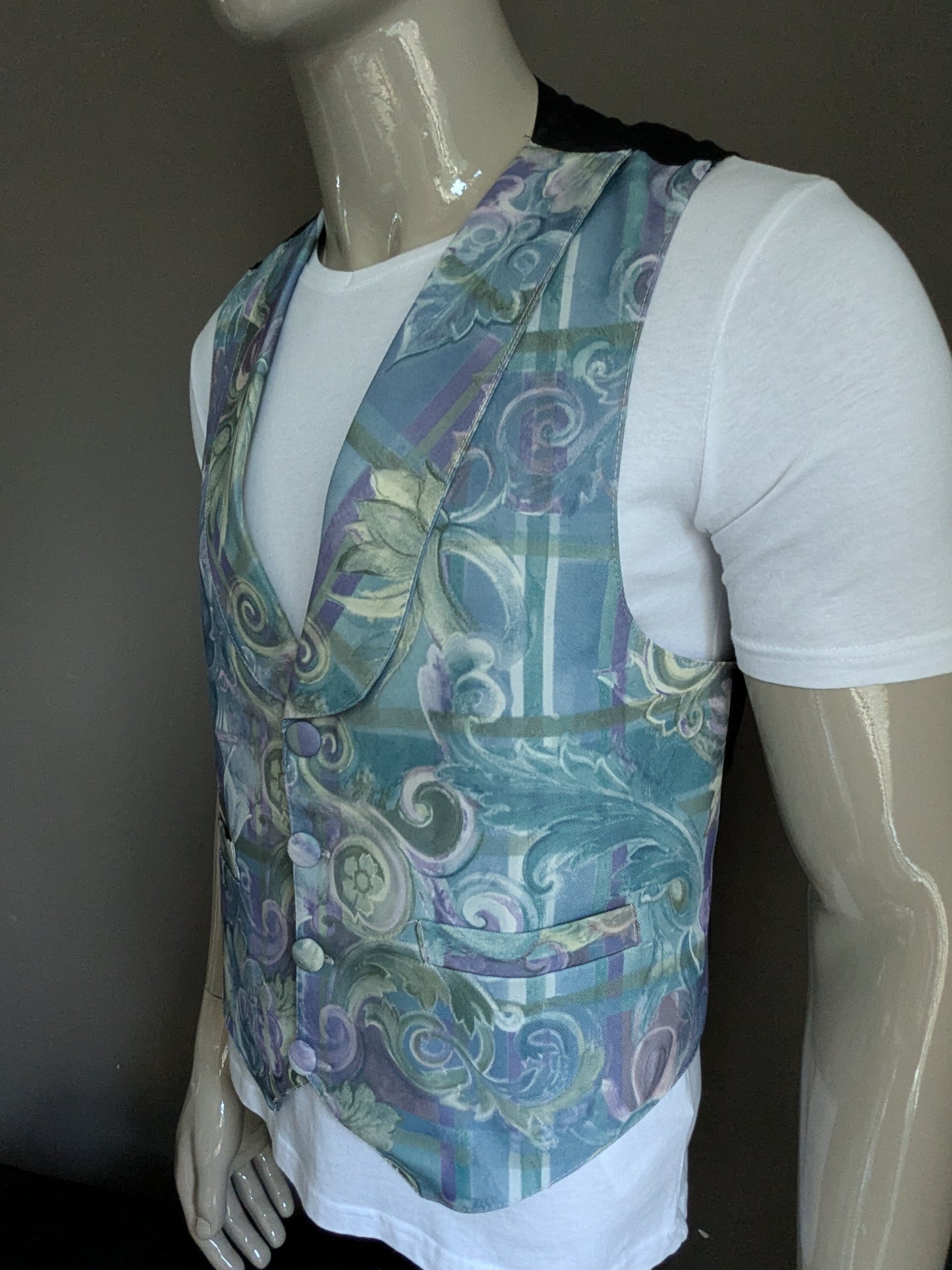 Vintage gilet met revers. Groen blauw paarse print. Maat L.