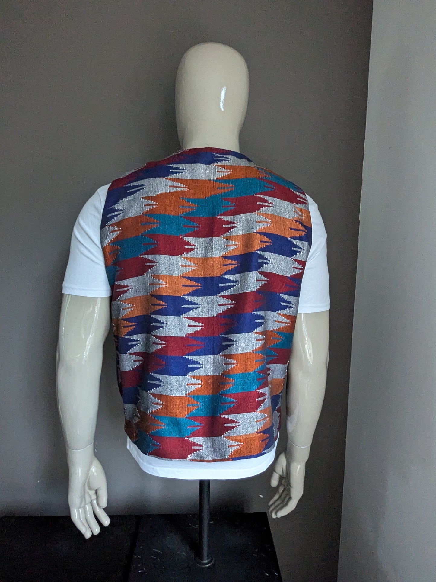 Vintage gilet. Grijs oranje blauw rood motief. Maat L.