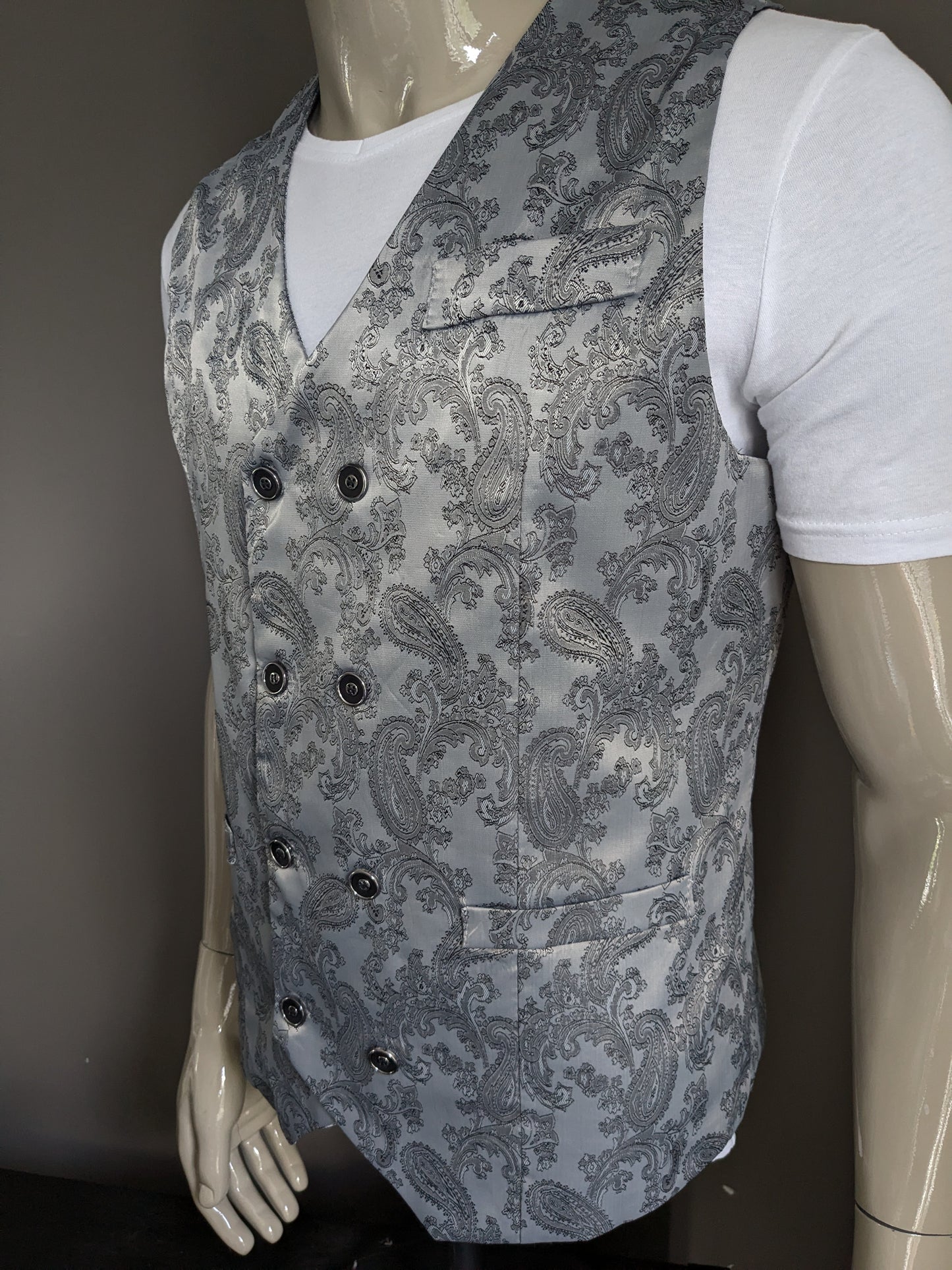 Gilet à deux poitrines vintage. Motif de coloration gris en argent. Taille L.