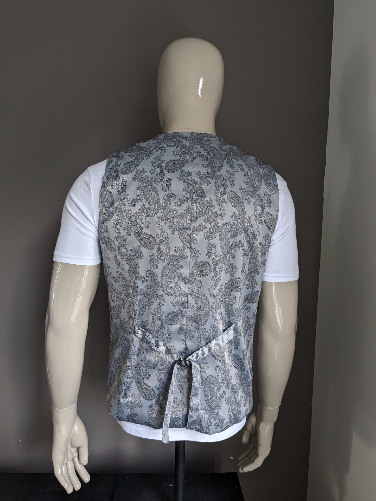 Gilet à deux poitrines vintage. Motif de coloration gris en argent. Taille L.