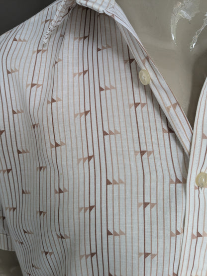 Vintage de la camisa corta de la camisa de Polane de los 70. Impresión beige marrón. Talla L.