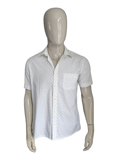 Modell Paris camicia corta. Stampa in bianco e nero. Taglia L.