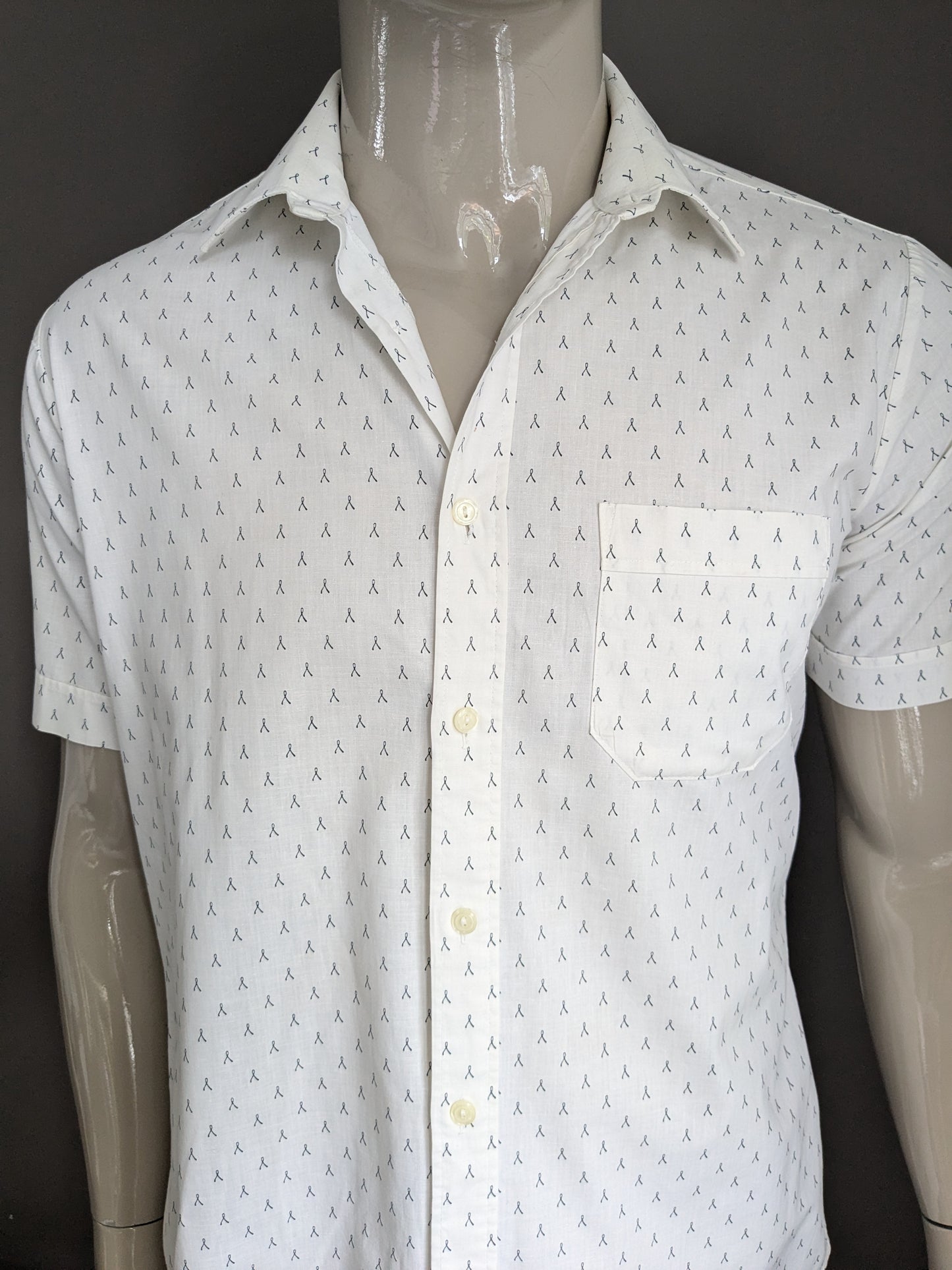 Modell Paris shirt short sleeve. Black and white print. Size L.