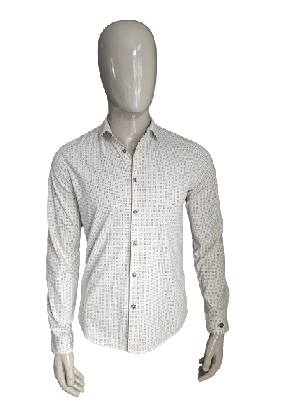 Camisa de hierro fundido. Impresión beige marrón. Tamaño M. estiramiento.