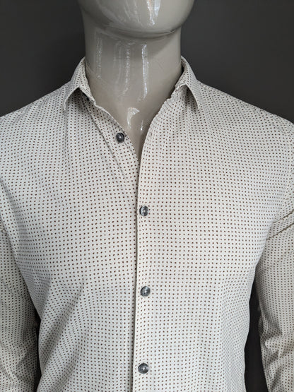 Camisa de hierro fundido. Impresión beige marrón. Tamaño M. estiramiento.