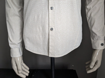 Camisa de hierro fundido. Impresión beige marrón. Tamaño M. estiramiento.