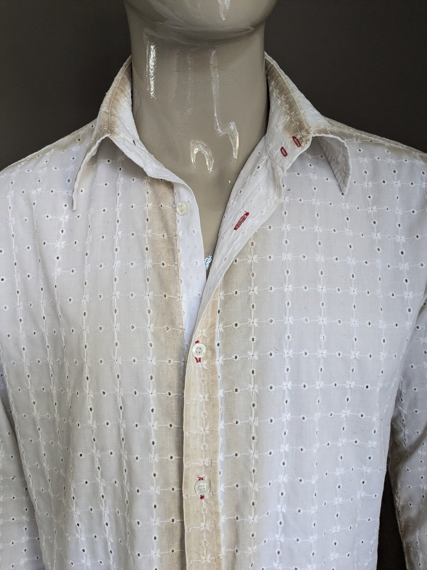 It's noize shirt. White beige holes motif. Size XL.