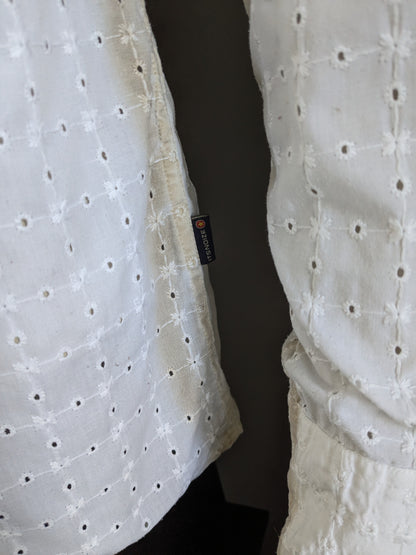 It's noize shirt. White beige holes motif. Size XL.