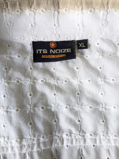 It's noize shirt. White beige holes motif. Size XL.