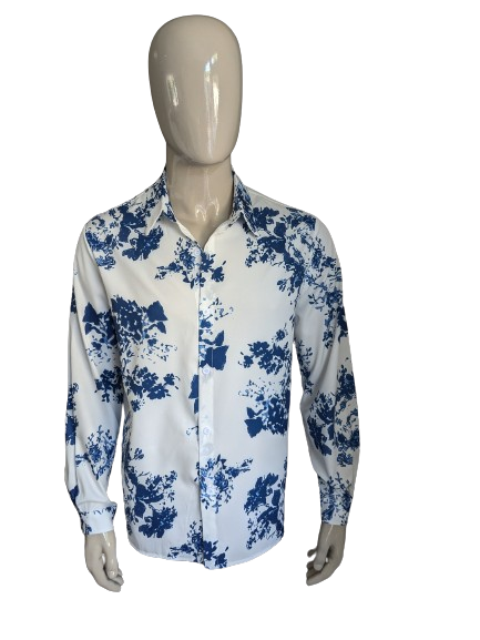 Polyester overhemd. Blauw witte print. Maat L.