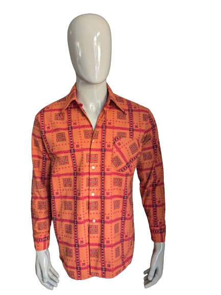 Camisa de los 70 vintage con cuello puntual. Estampado negro rojo naranja. Talla L.