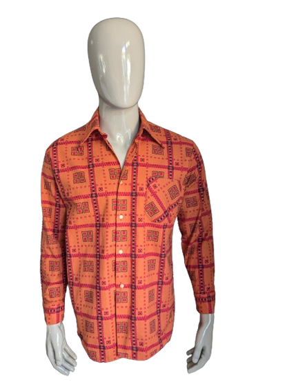 Chemise vintage des années 70 avec collier ponctuel. Impression noire rouge orange. Taille L.