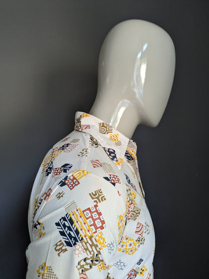 Vintage Michel 70's overhemd met puntkraag. Beige groen geel bruin blauwe print. Maat M.