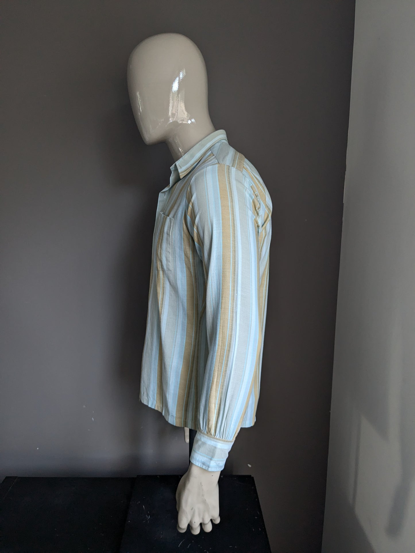 Chemise de style vintage Jeune 70. Brun bleu rayé. Taille L.