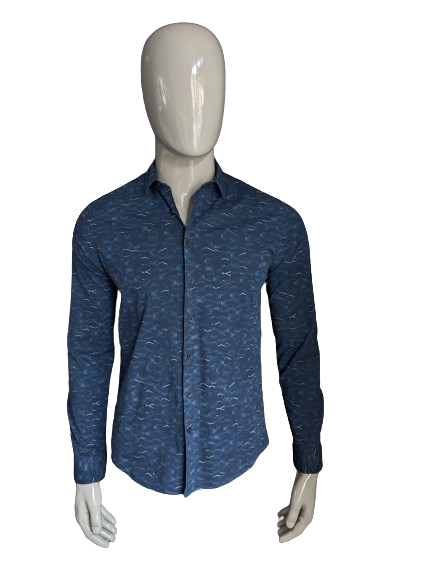 Camisa de hierro fundido. Motivo blanco azul oscuro. Tamaño M. estiramiento