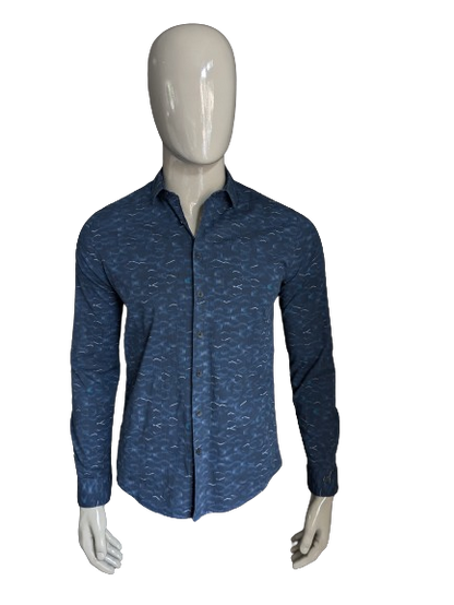 Camisa de hierro fundido. Motivo blanco azul oscuro. Tamaño M. estiramiento