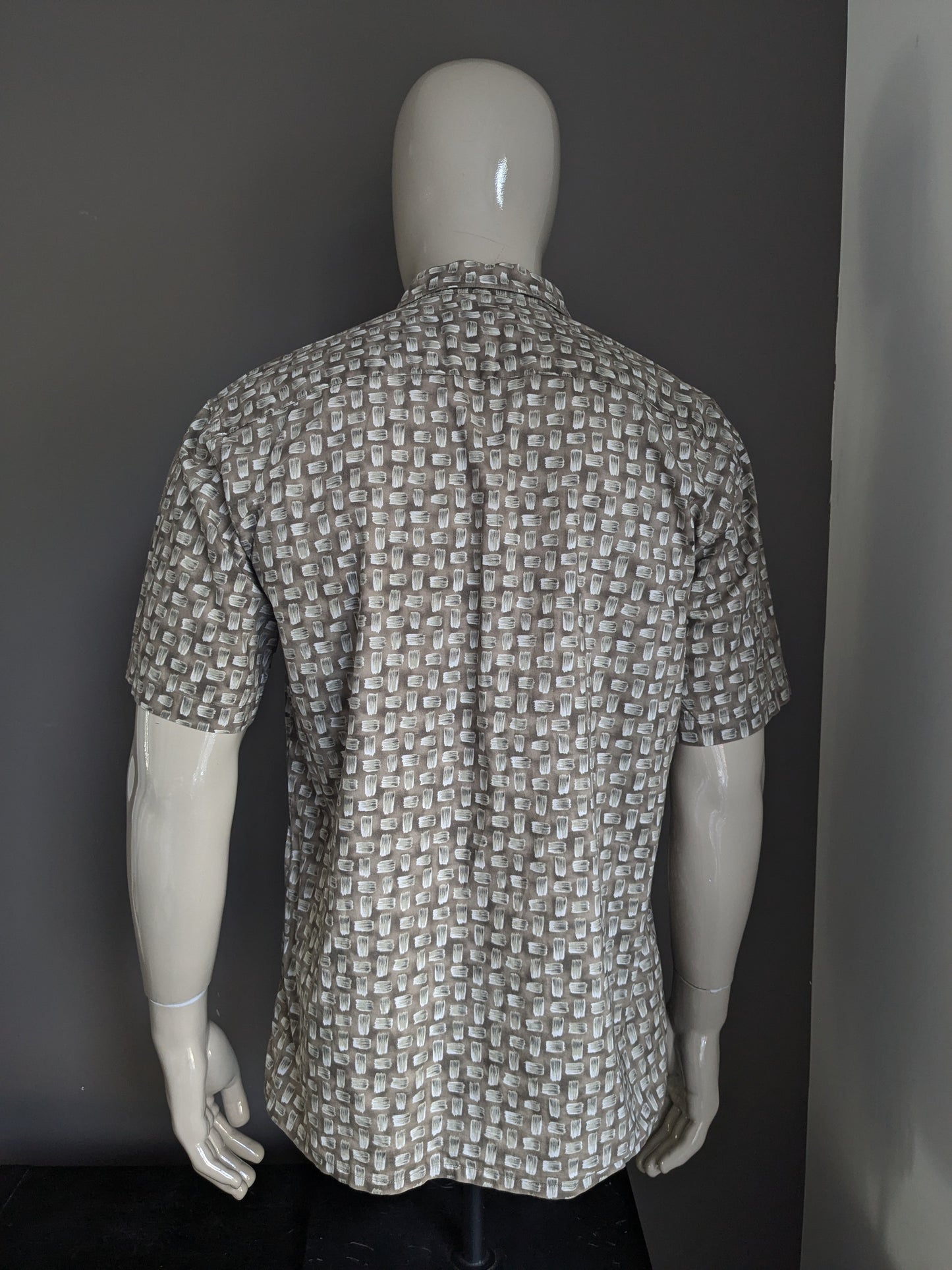 Camisa de Birmania Bibas manga corta. Estampado verde gris marrón. Tamaño M / L.