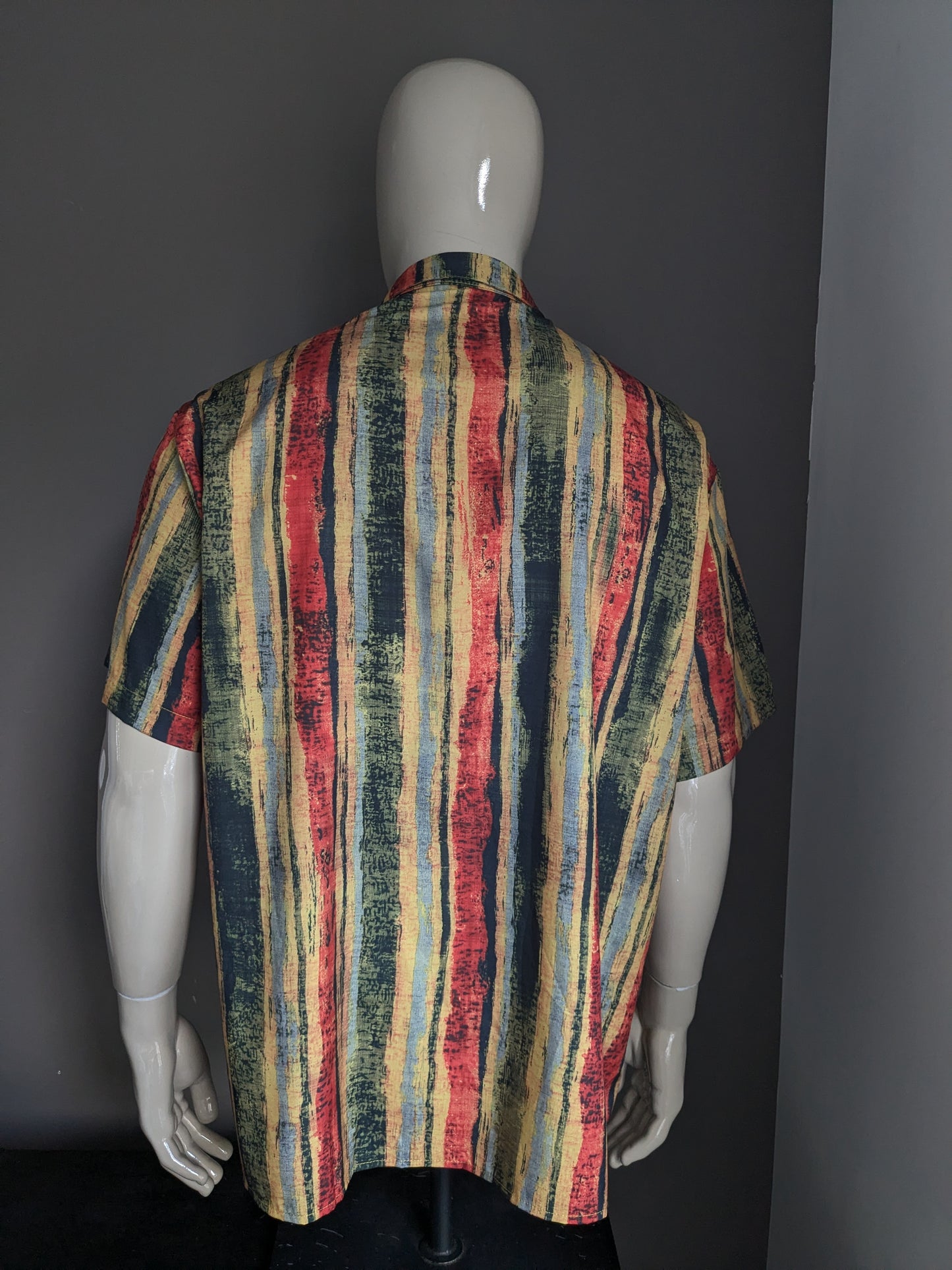 Misslook shirt short sleeve. Yellow red green black print. Size XXL.