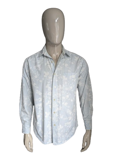 Eddie Bauer shirt. Light blue flowers and stripe motif. Size M / L.