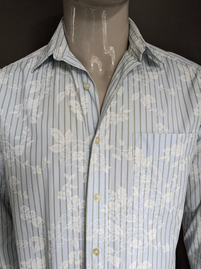 Eddie Bauer shirt. Light blue flowers and stripe motif. Size M / L.