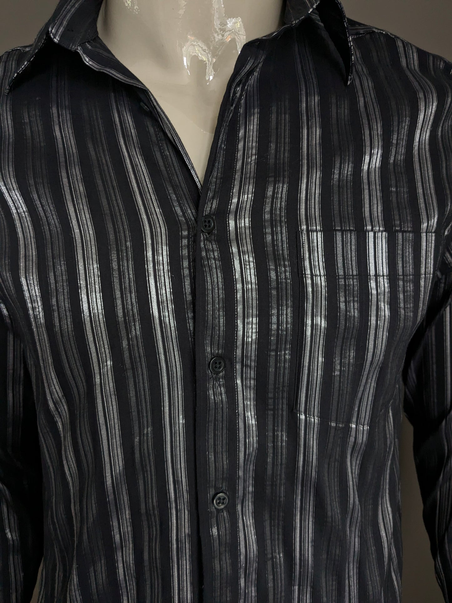 Vintage Roger has a shirt. Black / silver striped. Size L.