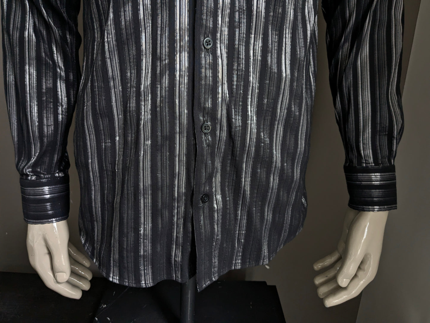 Vintage Roger has a shirt. Black / silver striped. Size L.